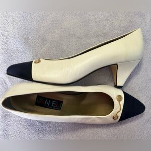 Van Eli Cream and Black Pointed Toe Chain-Detail Pumps